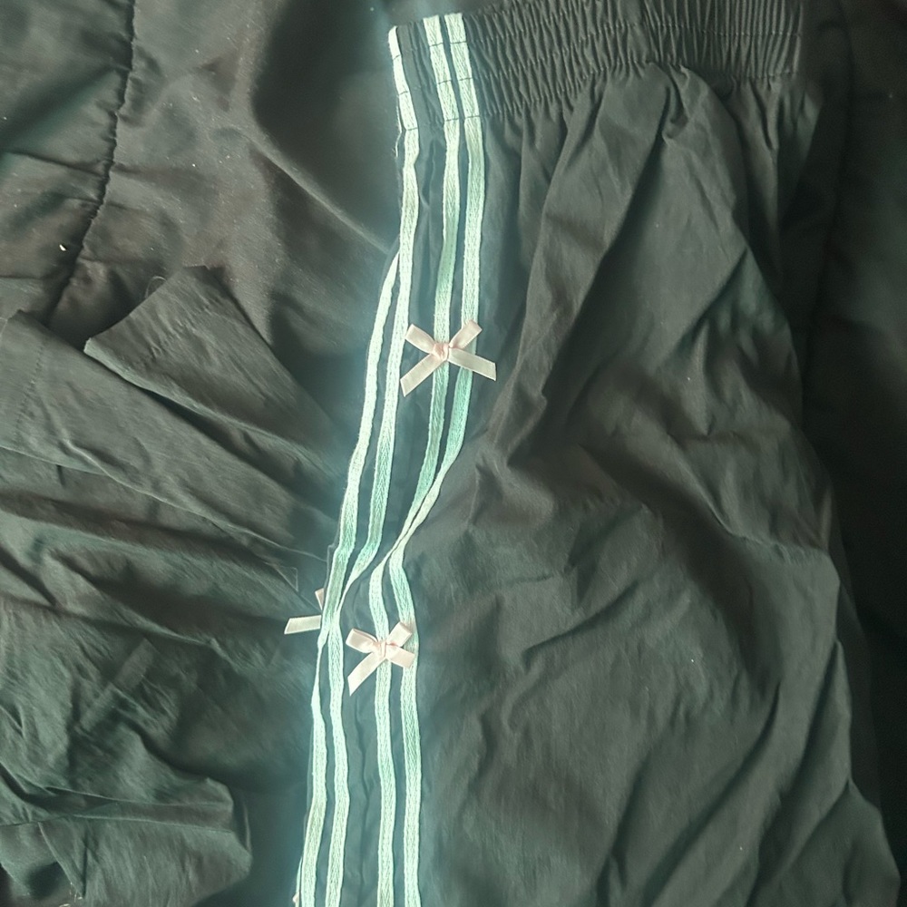 Black Pants with White Stripes and Bows